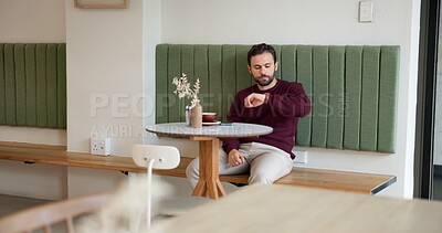 Buy stock photo Thinking, waiting and time with man in cafe for customer service, lunch order and date. Hospitality, reflection and late appointment with person in coffee shop for wristwatch, cafeteria or restaurant