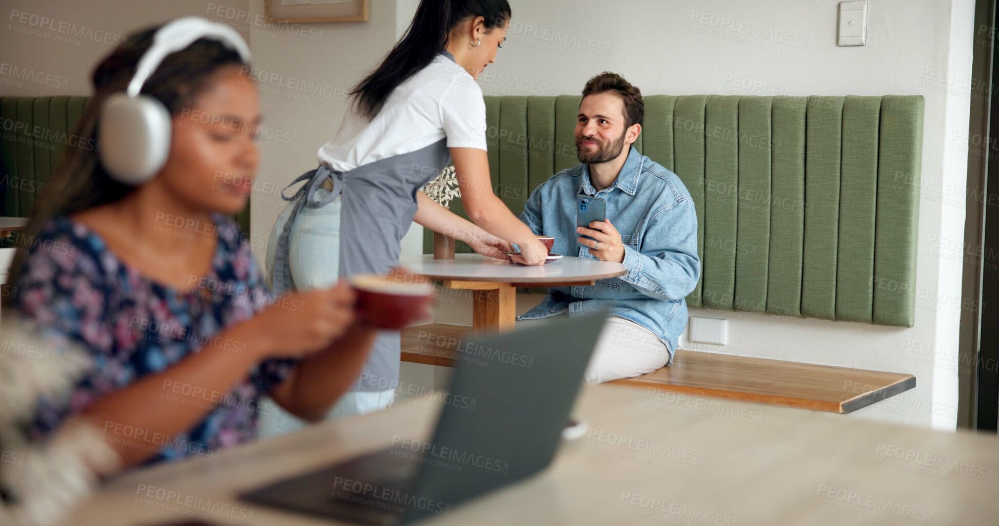 Buy stock photo People, waitress and smile in cafe for customer service, hospitality and free connectivity on phone. Happy man, employee and coffee in shop for order, small business support and interaction at table