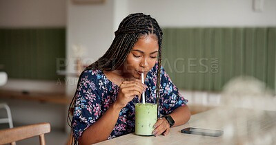 Buy stock photo Healthy, green smoothie and woman in cafe, diet and relax with breakfast, nutrition and organic shake. African person, customer and girl with drink, wellness and matcha with vegan coffee shop