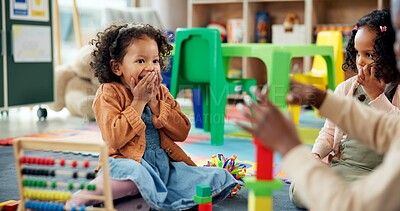 Buy stock photo Surprise, child and play with blocks in classroom for learning, problem solving and creative activity. Excited, kids and toys for education game, puzzle solution and motor growth in kindergarden