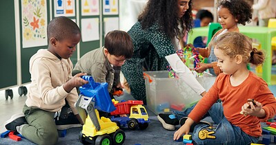 Buy stock photo Teacher, kids and play with blocks in classroom for learning, problem solving and creative activity. Woman, children and pack toys for education game, puzzle solution and motor growth in kindergarden