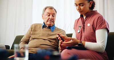 Buy stock photo Blood glucose meter, nurse and patient in retirement home for healthcare or medical checkup. Diabetes, finger prick or sample with caregiver woman and senior man in apartment for consultation