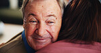 Hugging, empathy and senior man with nurse for consultation with good news, support and care. Smile, kindness and elderly patient embrace caregiver for happiness, comfort or thank you in nursing home