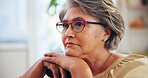 Thinking, elderly woman and relax at house for reflection, loneliness and nostalgia for past memory. Senior person, thoughts and remember for partner loss, waiting and mourning with dementia history