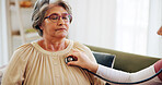 Senior woman, caregiver and stethoscope at house of medical exam, cardiology and listen to heartbeat. Elderly person, nurse and chest assessment for breathing, monitor heart rate and asthma wellness 