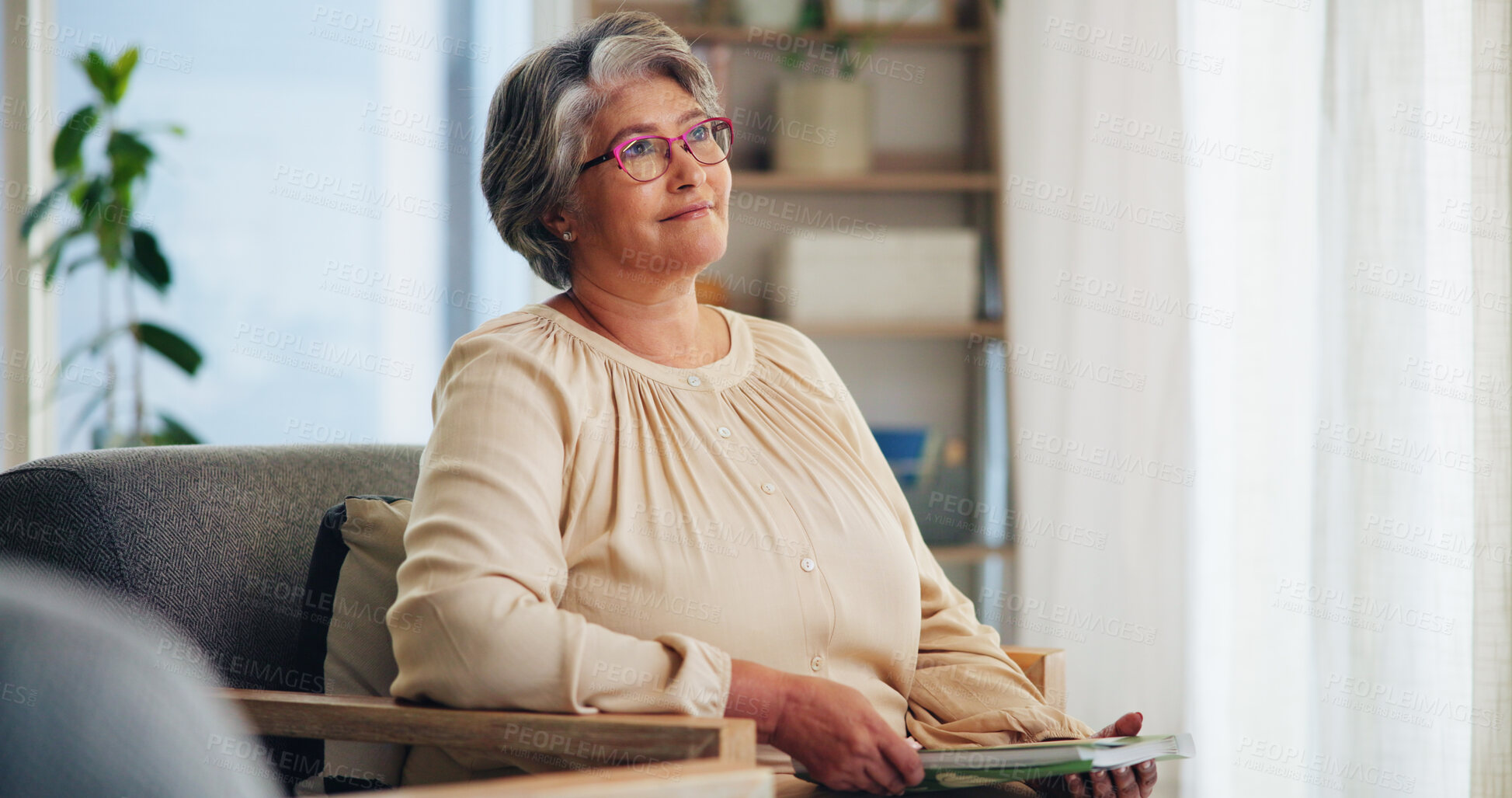 Buy stock photo Thinking, smile and senior woman at home with book for memory, nostalgia and glasses in living room. Pensioner, wellness and old person with photo album in house for retirement reflection and relax