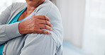 Person, hands or shoulder pain with injury at clinic for physiotherapy, joint inflammation or muscle tension. Closeup, patient or sore arm with ache for osteoporosis, discomfort or arthritis on space