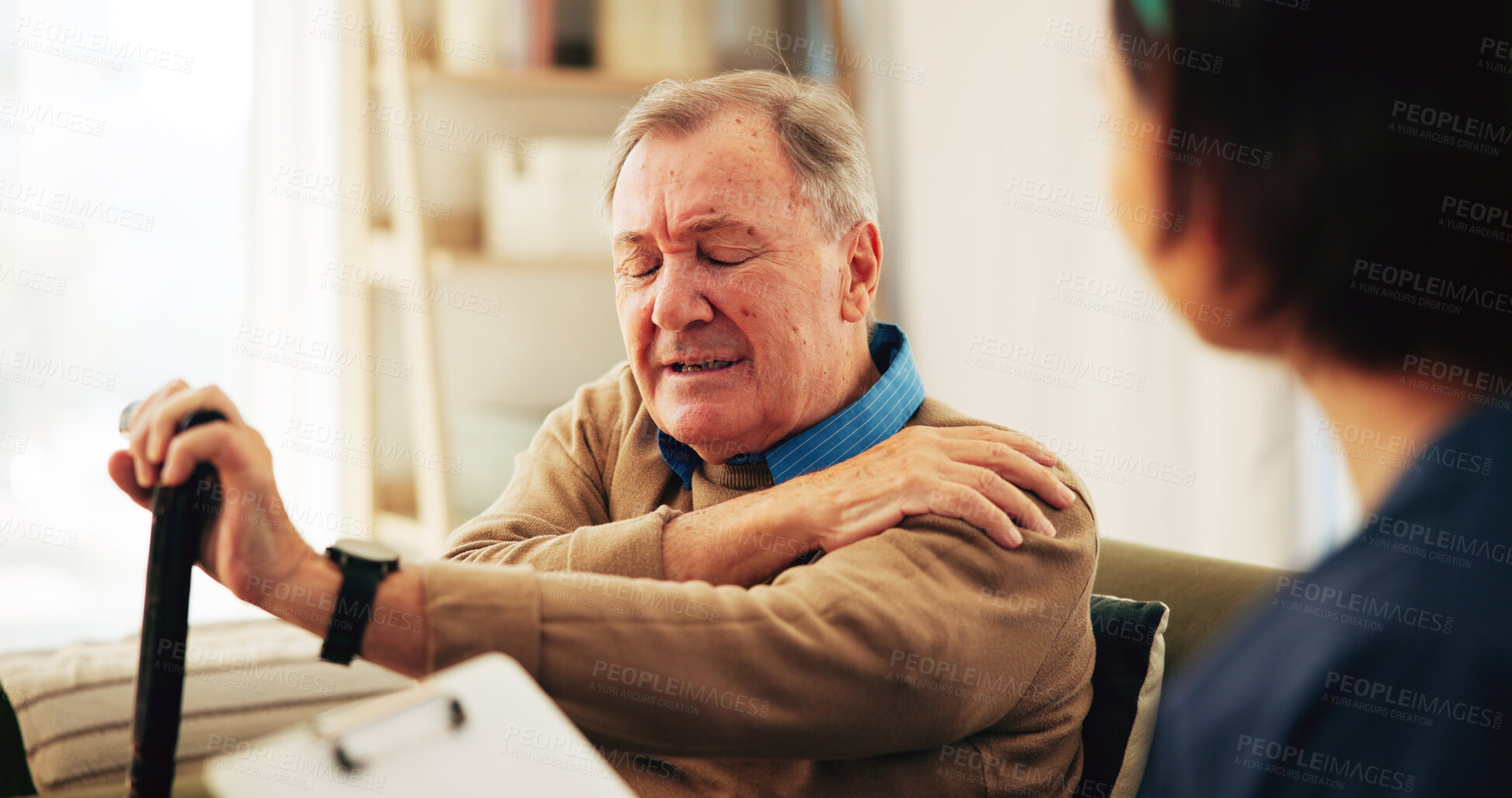 Buy stock photo Nurse, shoulder pain and senior man on sofa for assisted living, medical service and care in nursing home. Retirement, healthcare and caregiver with elderly person for consulting, support and help