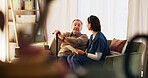 Nurse, discussion and senior man on sofa for assisted living, medical service and tablet in nursing home. Retirement, walking stick and caregiver with elderly person for consulting, support and help