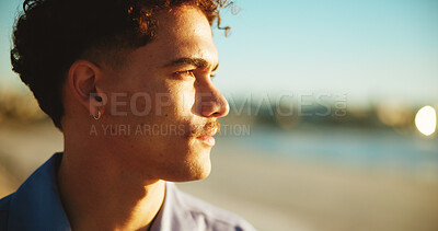 Buy stock photo Sunset, thinking and ocean with man, vacation and nature with memory, reflection and decision Seaside, summer holiday and person with weekend break, wonder and choice with peace, beach or travelling