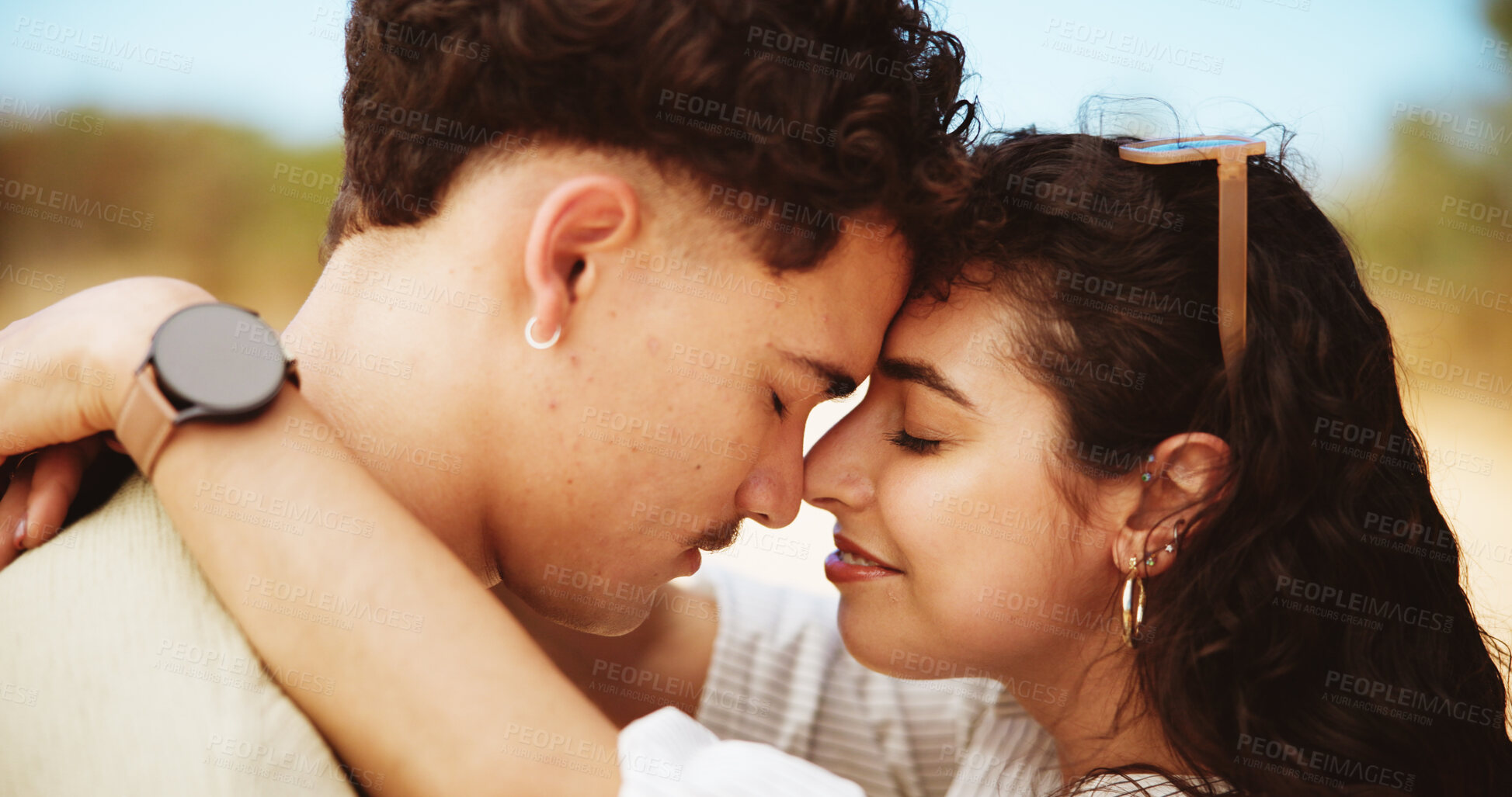 Buy stock photo Couple, love and hug with nature for bonding, commitment or travel together in outdoor safari. Man, woman or lovers with forehead touch, support or romance for calm embrace, road trip or adventure
