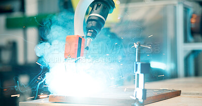 Buy stock photo Automation, tech and electrical drill in workshop for product manufacturing for prototype. Engineering, smoke and welding equipment for production, repair or process with heat sparks in warehouse