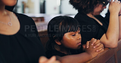 Buy stock photo Religion, praying and child in church with family for memorial, burial or funeral service. Worship, spiritual guidance and girl kid with prayer for hope, faith or respect with gospel in chapel.
