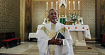 Church, priest and man with bible, gospel and preacher with book for sermon, holy or spiritual. Worship, God and mature person with faith for ceremony, catholic and prayer with belief or Christianity