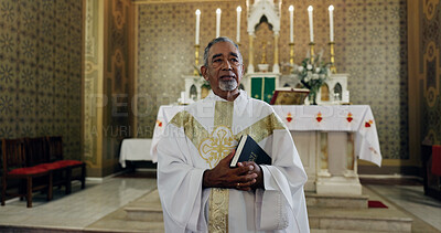 Buy stock photo Church, priest and man with bible, gospel and preacher with book for sermon, holy or spiritual. Worship, God and mature person with faith for ceremony, catholic and prayer with belief or Christianity