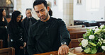Sad, man and rose at funeral for farewell service, mourning death and goodbye at burial ceremony. Male person, flowers and respect with rip, loss memorial and emotional gathering at community church