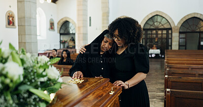 Buy stock photo Loss, sad or family with hug in funeral for farewell service, mourning death or grief in church. Women, goodbye or people with casket or flowers in Christian cathedral for burial, support or memorial
