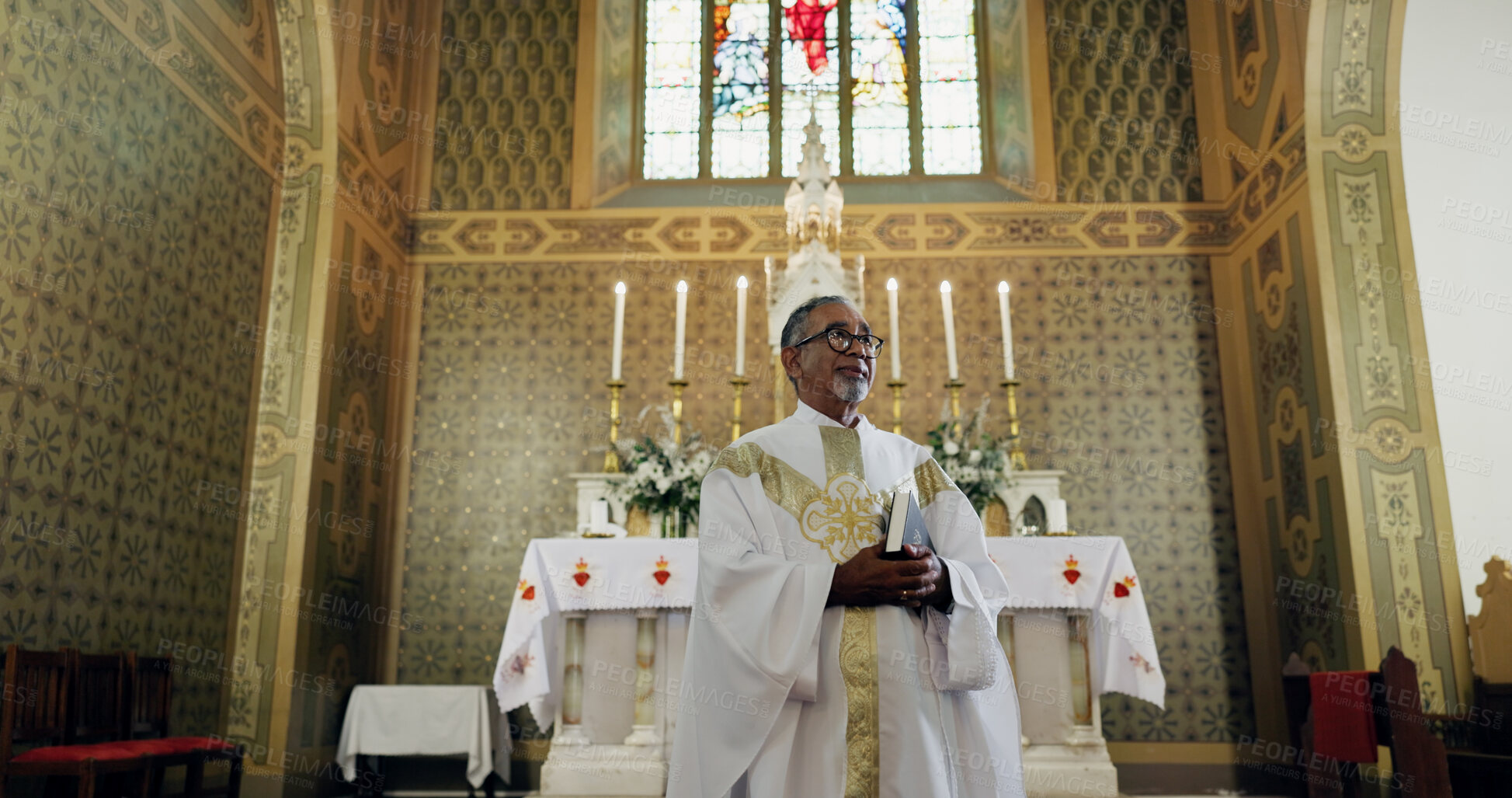 Buy stock photo Church, priest and man with bible, Christianity and preacher with book for sermon, holy or spiritual. Worship, God and mature person with faith for ceremony, Catholic and prayer with gospel or belief