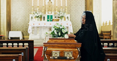 Buy stock photo Sad, woman and coffin with rose at funeral for farewell, mourning death and goodbye at burial ceremony. Mature person, widow and rip with flower for respect, memorial service and emotional for loss