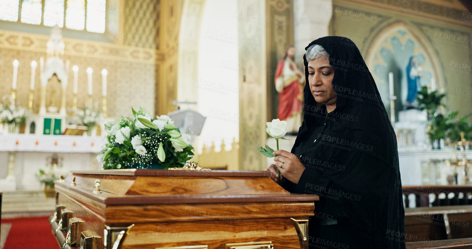Buy stock photo Mature woman, coffin and rose at funeral for farewell, mourning death and goodbye at burial ceremony. Sad, female widow and rip with flower for casket respect, memorial service and emotional for loss
