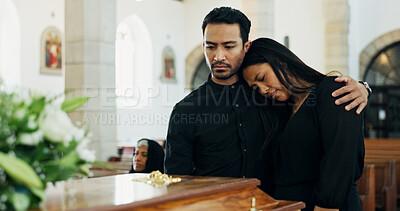 Buy stock photo Death, comfort or couple mourning at funeral in church for respect, support or embrace for loss together by coffin. Sad man, woman or grief at memorial service with casket for goodbye, rip or console