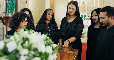 Buy stock photo Funeral, people and family with coffin in church for farewell service, mourning death or grief. Respect, goodbye or group with casket or flowers in Christian cathedral for burial, support or memorial