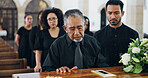 Sad, people and coffin at funeral for farewell service, mourning death and goodbye at burial ceremony. Men, family and respect with rip, memorial comfort and emotional gathering at community church