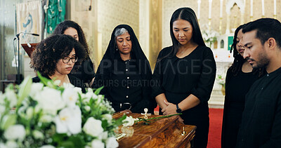 Buy stock photo Respect, people and family with coffin in funeral for farewell service, mourning death or grief. Church, goodbye or group with casket or flowers in Christian cathedral for burial, support or memorial