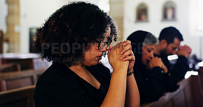 Buy stock photo Religion, praying and woman in church with family for memorial, praise or funeral service. Worship, spiritual guidance and female person with prayer for hope, faith or respect with gospel at burial.