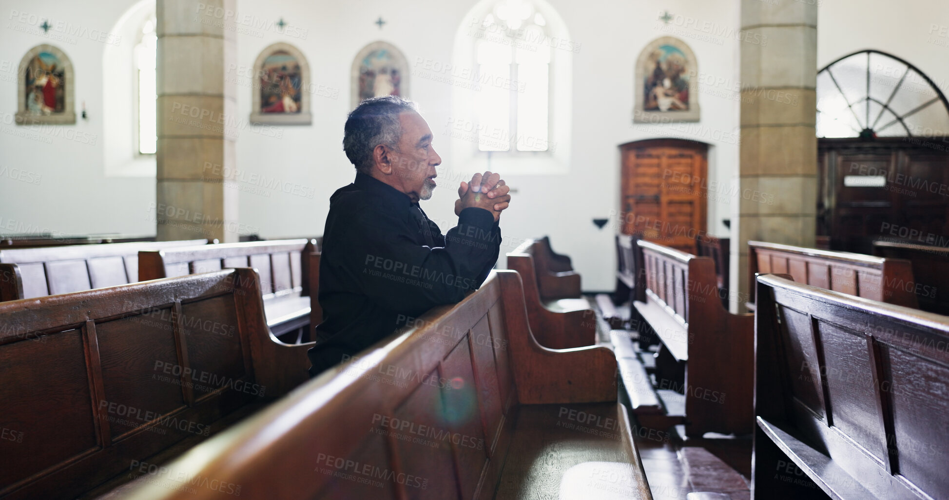 Buy stock photo Church, senior man and prayer for faith with religion, respect or worship God at funeral service. Christian, chapel and person praying for hope, holy spirit or widower ask for forgiveness at memorial