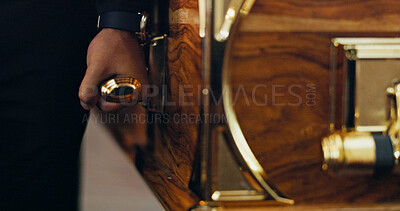 Buy stock photo Funeral, carry or hands of person with coffin in church for farewell service, mourning death or honor. Closeup, box and grieving with respect in cathedral for burial, casket and memorial ceremony
