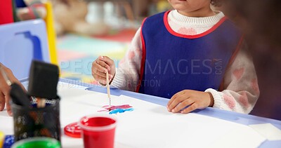 Buy stock photo Learning, kid and hands painting for art, creative talent and development in preschool class. Education, students drawing and child with watercolor for growth, artwork and sketch on paper with brush