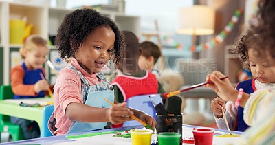Buy stock photo Education, kids and girls in painting class for art, creative talent and motor skill development in preschool. Learning, students drawing and children with color for artwork and sketch with brush