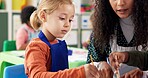 Classroom, teacher and kids with painting for education, creativity and skills development in school. Hands, educator and children as students for brushes, learning or growth for girl in kindergarten
