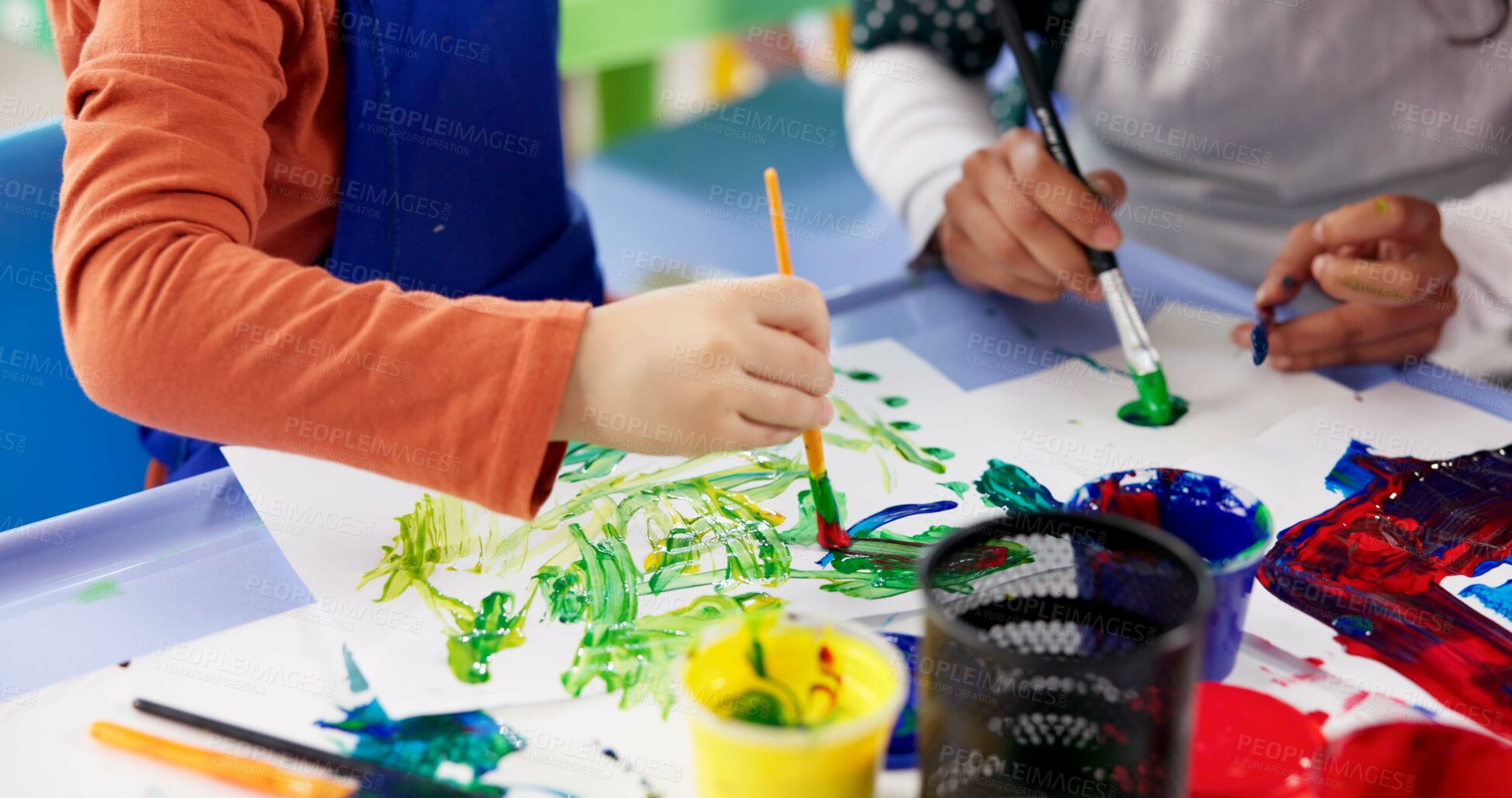 Buy stock photo Education, hands and children with painting for kindergarten, creativity or skills development. Closeup, drawing and kids as students for artwork project, learning or motor growth with brush in class