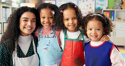 Buy stock photo Happy children, portrait and teacher with hug at kindergarten school for elementary education. Group, educator or kids with smile for fun learning, creativity or childhood development in classroom