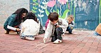 Kindergarten school, children and drawing with chalk on floor or playground for fun outdoor activity. Kids, group or creative youth with teacher for art, game or childhood development at elementary