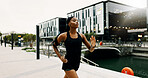 Black woman, running and fitness in city for health, breathing and wellness with athlete training outdoor. Female person, cardio workout and exercise with sports, self care and runner in urban town