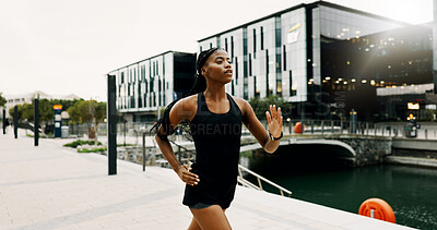 Buy stock photo Black woman, running and fitness in city for health, breathing and wellness with athlete training outdoor. Female person, cardio workout and exercise with sports, self care and runner in urban town