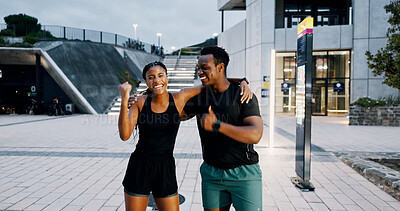 Buy stock photo Runner, hug and smile with black people in city for personal trainer, workout goals and fist bump. Coaching success, night and teamwork with man and woman outdoors for exercise, wellness or celebrate