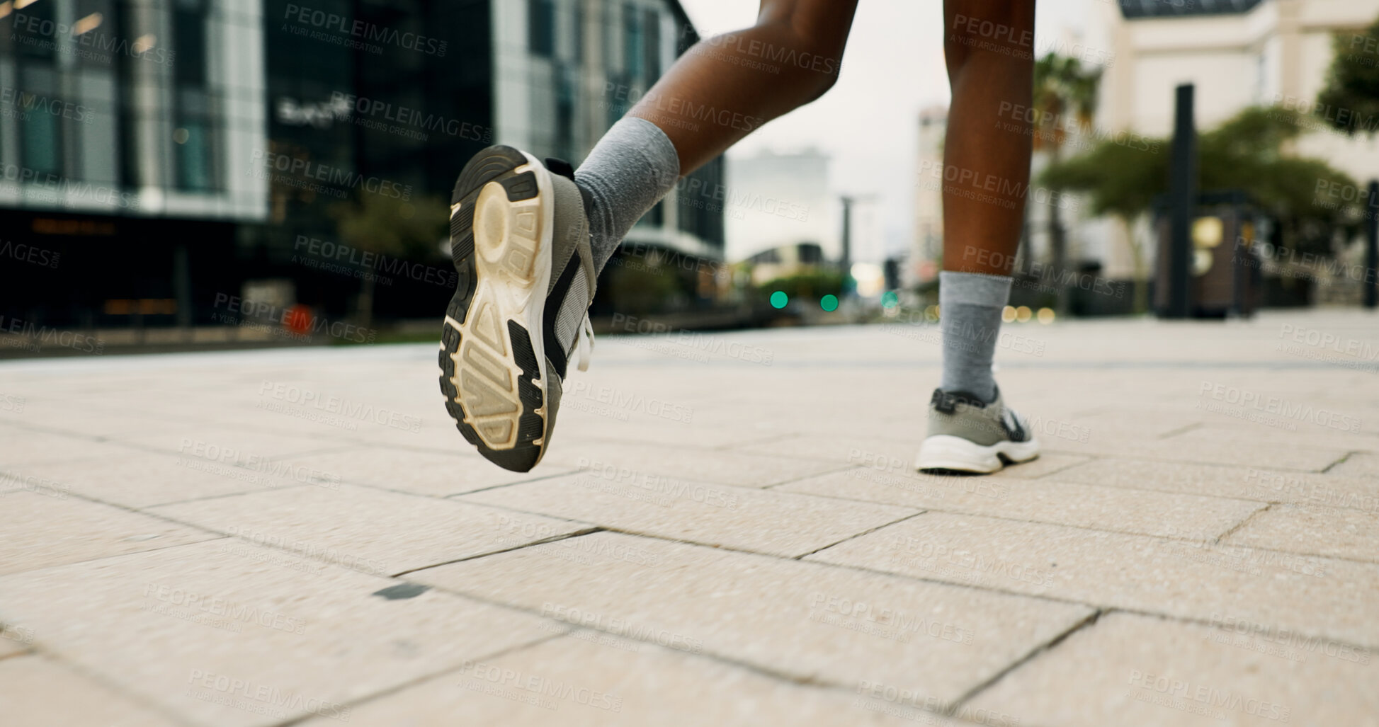 Buy stock photo Legs, fitness and sneakers for running in city, concrete floor and movement for cardio workout for health. Exercise, wellness and athlete person training for race, marathon or feet with sport in town