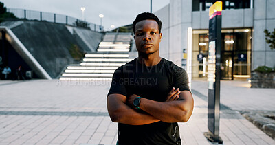 Buy stock photo Portrait, serious and man with arms crossed, fitness and confident for bodybuilding on road or break. Outdoor, athlete and black person with muscle on urban street, proud and wellness with sportswear