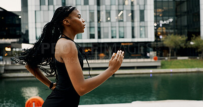Buy stock photo Black woman, running and exercise in city for health, breathing and wellness with athlete training outdoor. Female person, cardio workout and fitness with sports, self care and runner in urban town