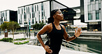 Black woman, running and workout in city for health, breathing and wellness with athlete training outdoor. Female person, cardio fitness and exercise with sports, self care and runner in urban town