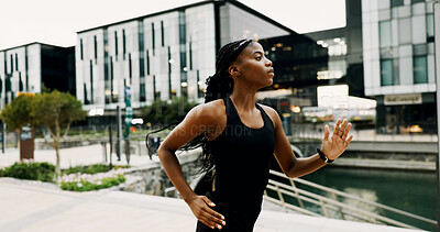 Buy stock photo Black woman, running and workout in city for health, breathing and wellness with athlete training outdoor. Female person, cardio fitness and exercise with sports, self care and runner in urban town