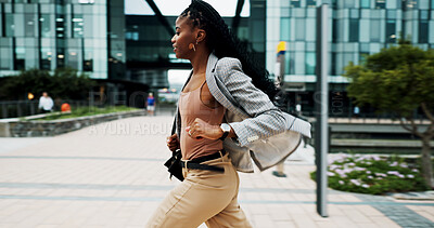 Buy stock photo Black woman, city and running late for job, rush or commute with speed to business office. Schedule, time management and fast journey to workplace, African female person outdoor and morning delay