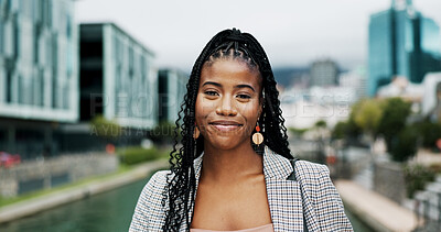 Buy stock photo Travel, portrait and business with black woman in city for property developer, confidence and professional. Happiness, real estate agent and commute with person outdoors for career, pride and urban