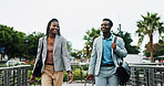 Walking, suitcase and African business people in city for commute, travel and arrival for meeting. Corporate, professional and man and woman with luggage in town for journey, destination and trip