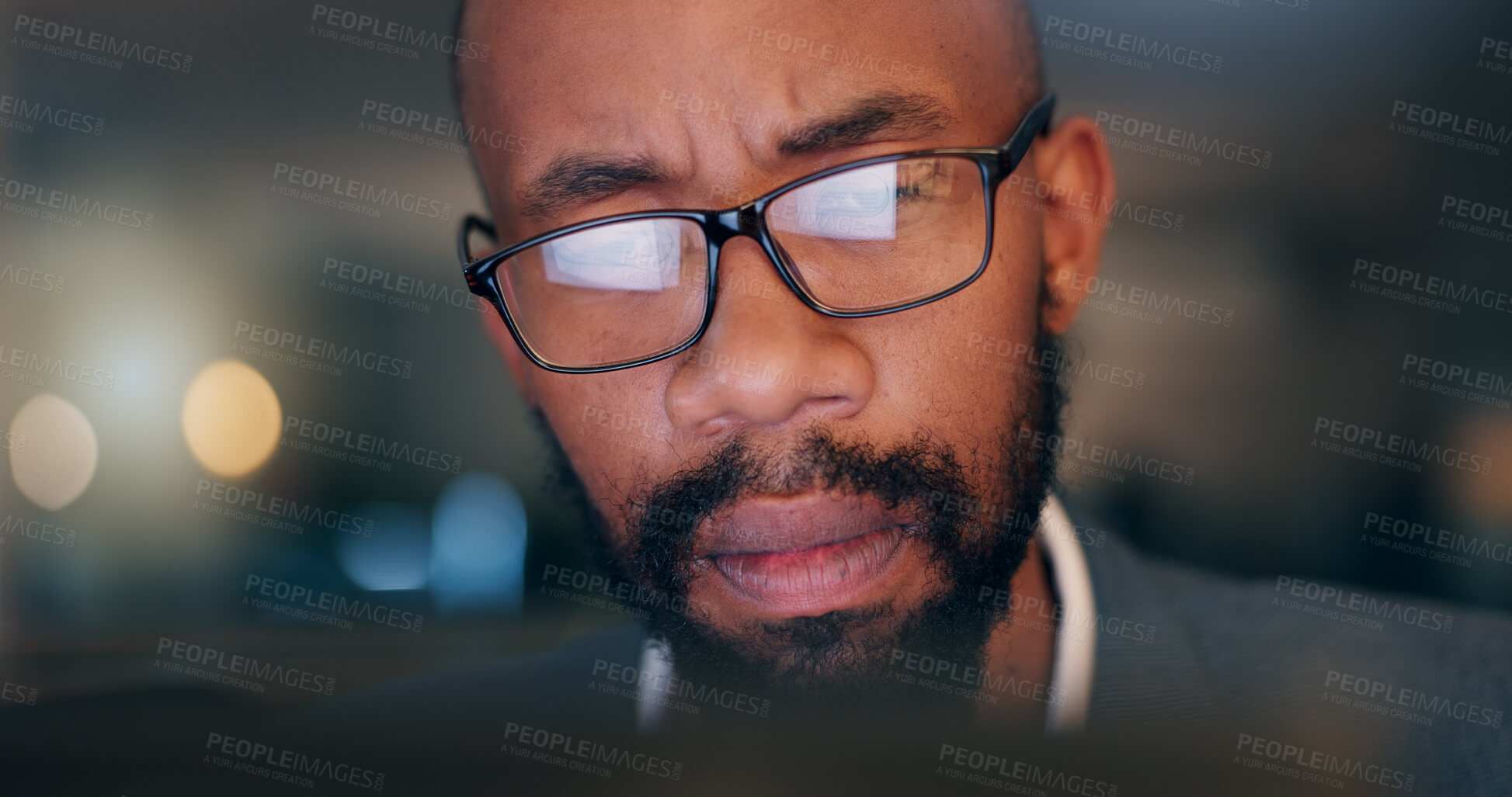 Buy stock photo African man, computer and closeup at office, night and reading proposal with overtime at media company. Person, editor or writer by pc with glasses for deadline, project or time management at agency