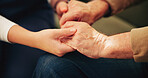 Holding hands, therapy and caregiver with senior patient for consulting in closeup, nursing home or retirement. Wellness, healthcare and touching elderly person for compassion, empathy or medic help